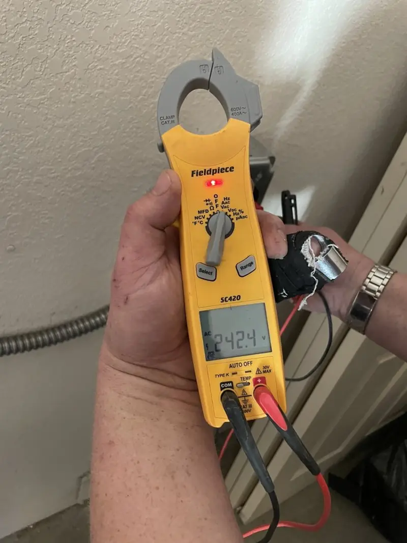 Voltage testing with clamp meter during Ceiling Fan Installation in Mount Joy